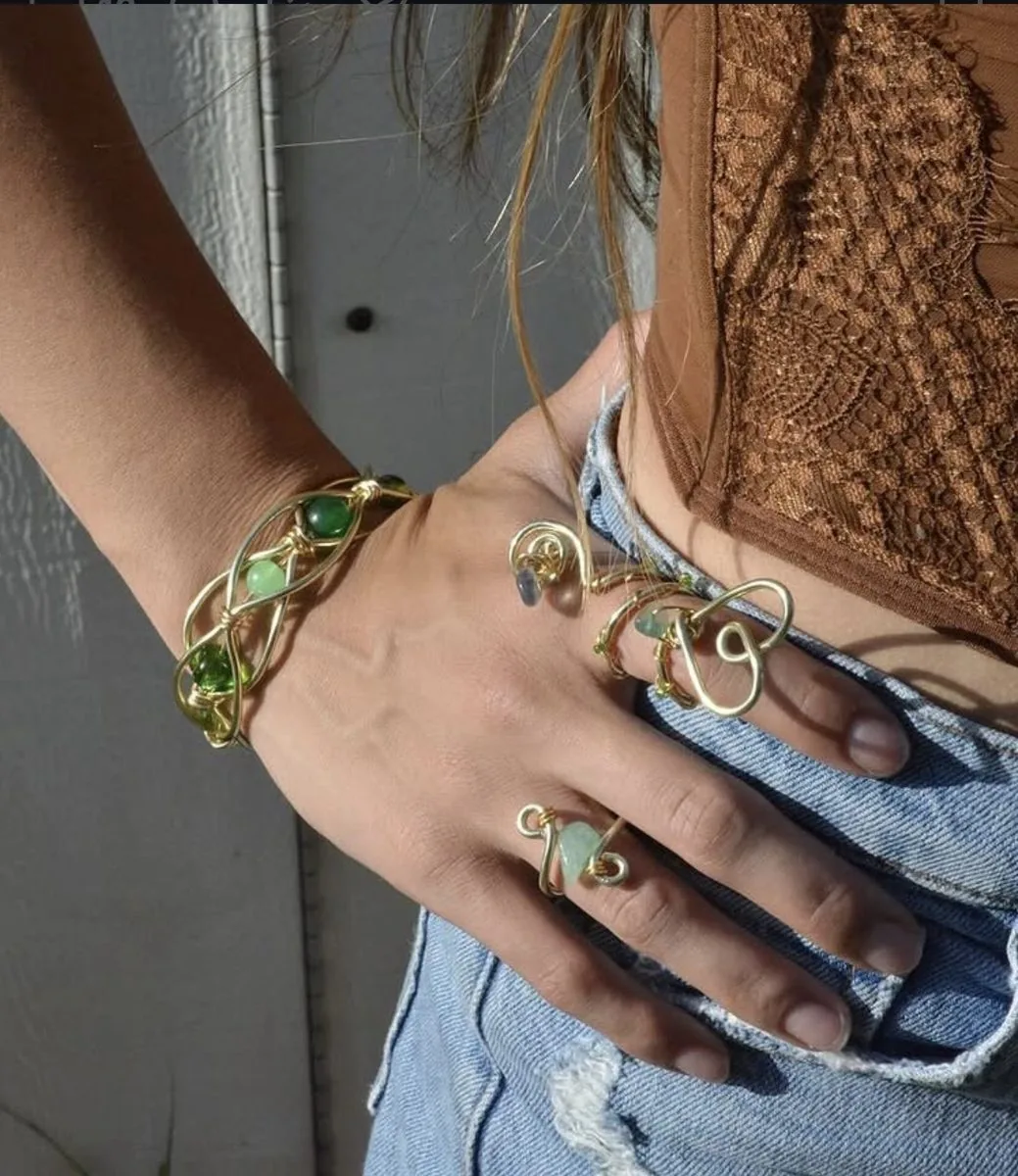 Custom green stone hand jewelry